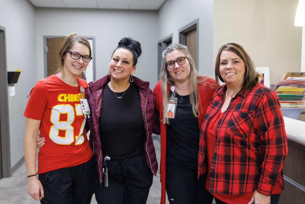Hunter Health smiling for Heart Health with Wear Red Day