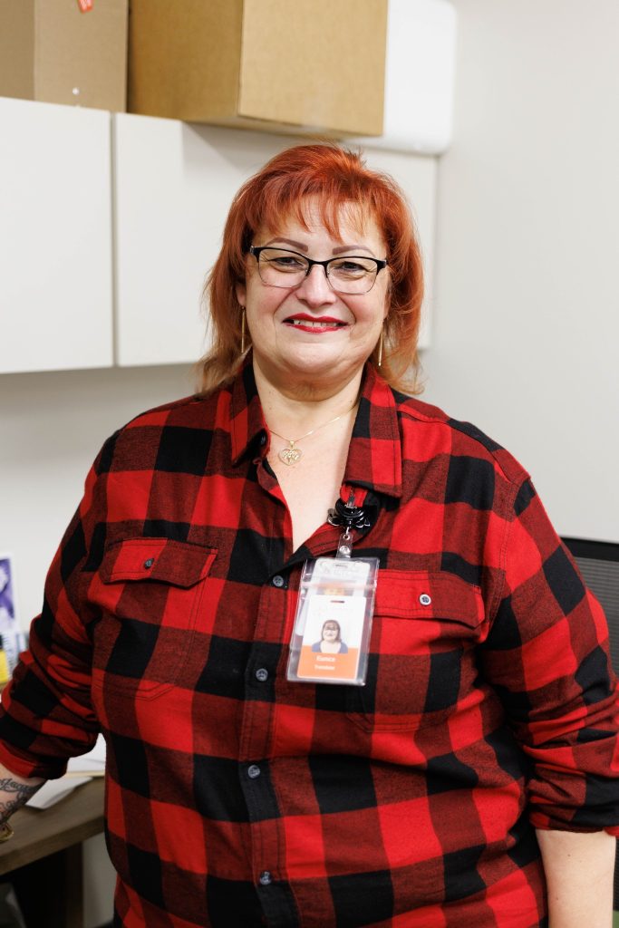 In flannel recognizing Heart Health with Wear Red Day